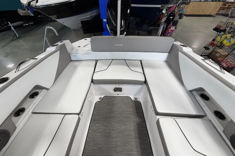 Slide: The Image of 2024 Glastron GTD 240 boat interior with spacious seating and modern design. - 14