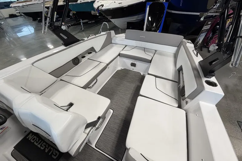 Slide: The Image of 2024 Glastron GTD 240 boat interior with spacious seating and modern design. - 15