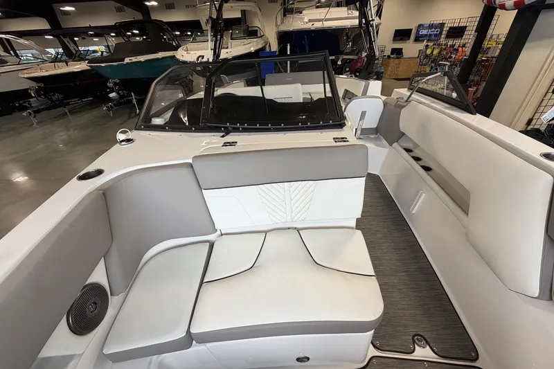 Slide: The Image of 2024 Glastron GTD 240 boat interior with sleek seating and modern design. - 25