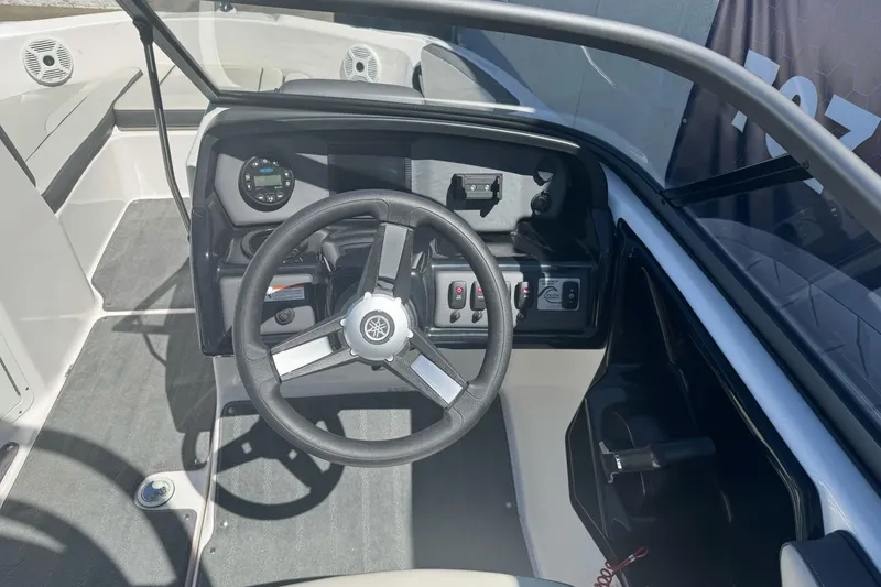 Slide: The Image of 2022 Yamaha Boats AR190 dashboard with steering wheel and control panel. - 20