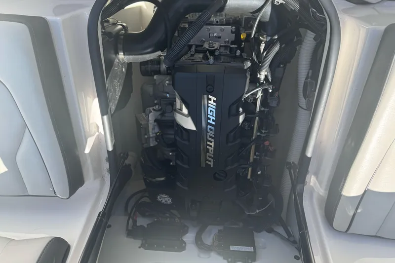 Slide: The Image of 2022 Yamaha Boats AR190 engine compartment showcasing high output engine components. - 28