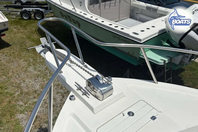 Slide: The Image of Bow of 2021 Parker 2520 XLD Sport Cabin with anchor chain and railing. - 4