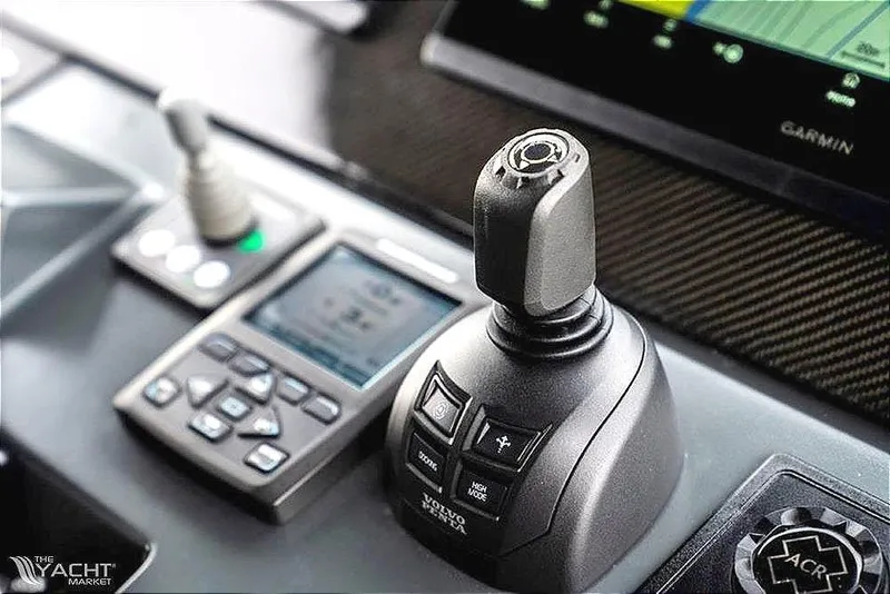 Slide: The Image of Control panel of 2013 Windy SR52 yacht with joystick and navigation display. - 10