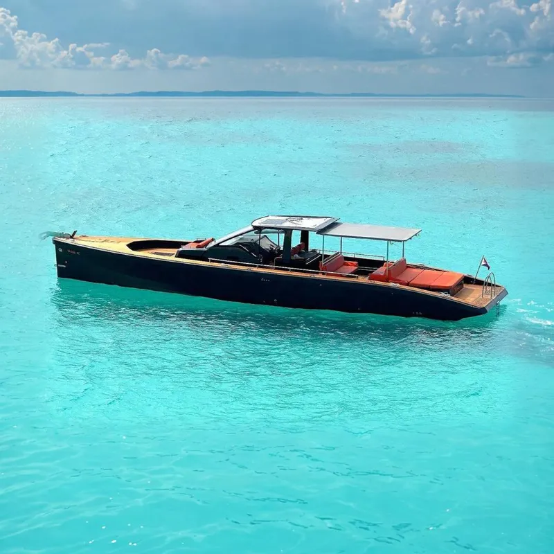 Slide: The Image of Luxury Windy SR52 yacht from 2013 on turquoise water. - 2