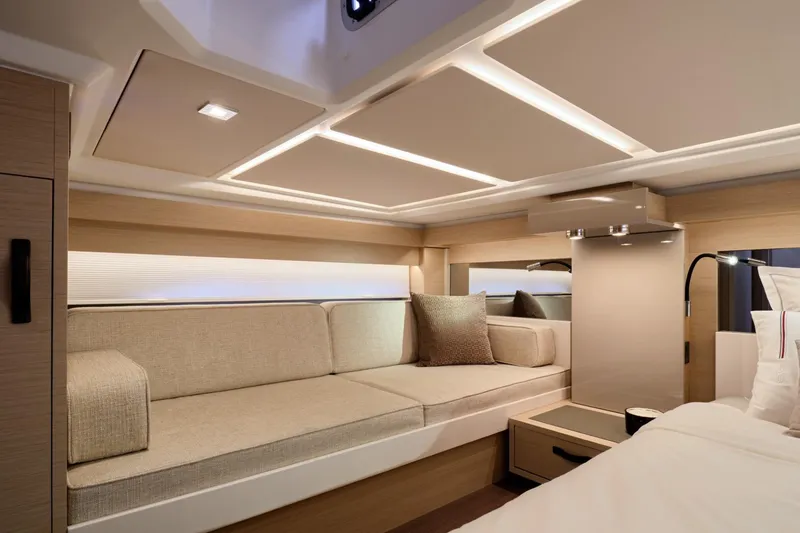 Slide: The Image of Luxurious interior of 2027 Jeanneau DB/43 OB yacht with modern seating and lighting. - 11