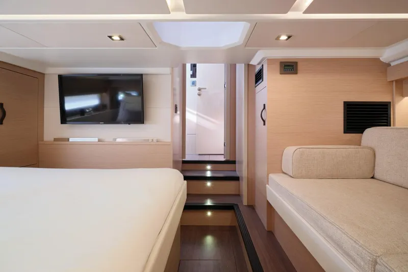 Slide: The Image of Luxurious interior of 2027 Jeanneau DB/43 OB yacht with modern furnishings and TV. - 9