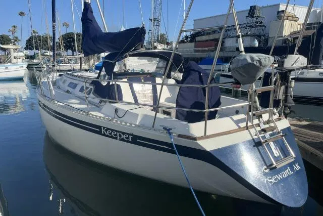 The Image of 1985 Islander Peterson 40 sailboat docked in marina, named "Keeper," Seward, AK. - 1