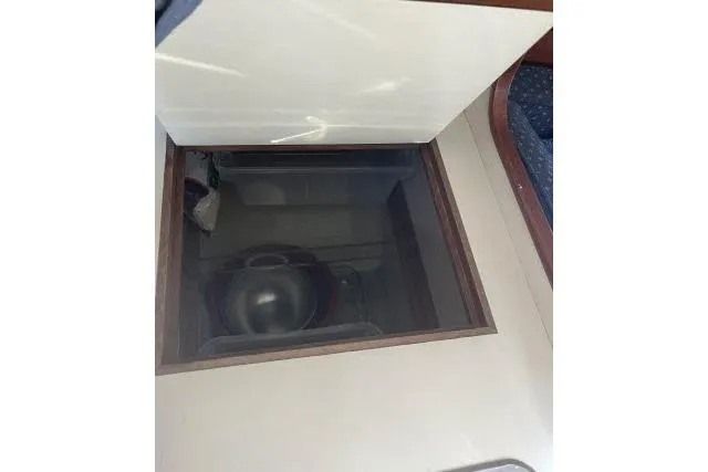 Slide: The Image of Hatch opening on 1985 Islander Peterson 40 sailboat interior. - 11