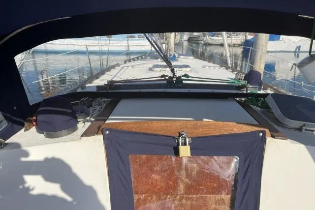 Slide: The Image of 1985 Islander Peterson 40 sailboat deck view at marina. - 28