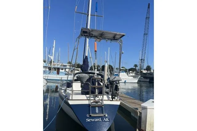 Slide: The Image of 1985 Islander Peterson 40 sailboat docked in Seward, AK marina. - 38