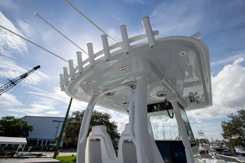 Slide: The Image of Freeman 28 boat 2023 with fishing rod holders and sunshade. - 24