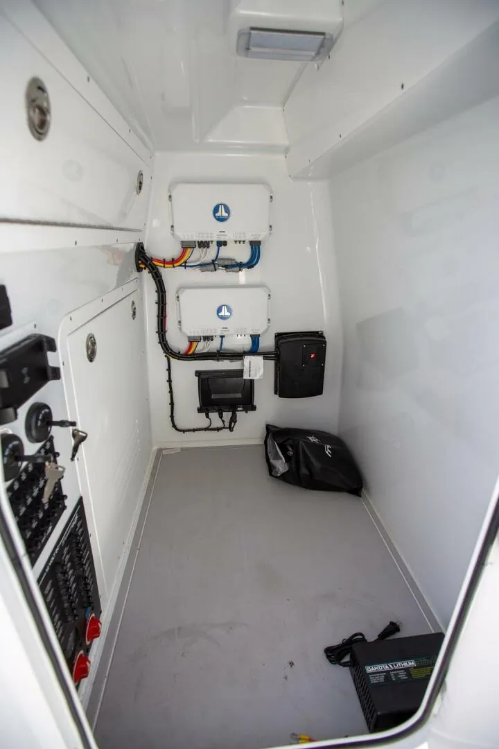 Slide: The Image of Interior of a 2023 Freeman 28 boat with electronics. - 25