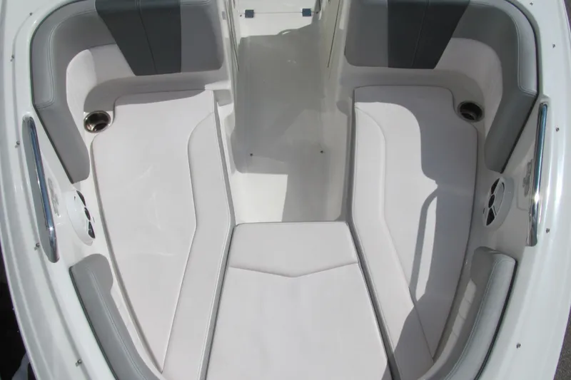 Slide: The Image of 2019 Chaparral 21 H2O Sport boat interior with white and gray seating. - 10