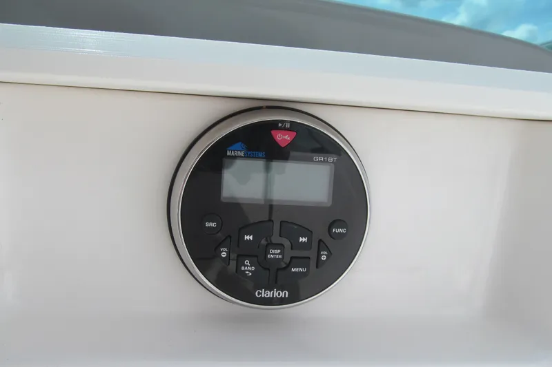 Slide: The Image of Clarion marine audio system on 2019 Chaparral 21 H2O Sport boat dashboard. - 8