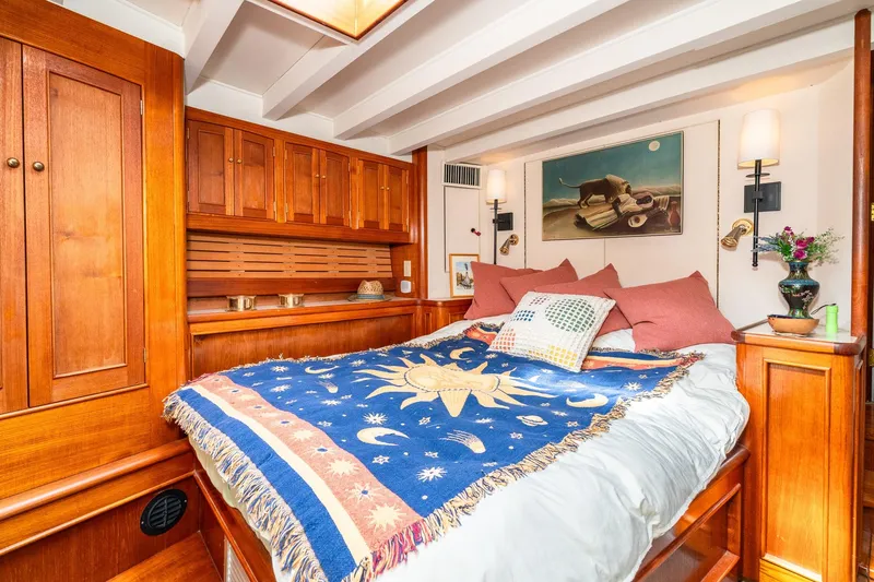 Slide: The Image of Cozy cabin in 1971 Philbrook's Trawler with wooden furnishings. - 33