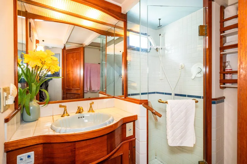 Slide: The Image of Elegant bathroom on 1971 Philbrook's Trawler with flowers and shower. - 38