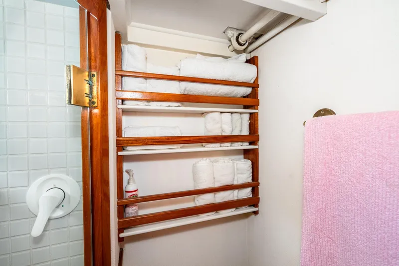 Slide: The Image of Bathroom shelf with towels on Philbrook's Trawler 1971. - 41
