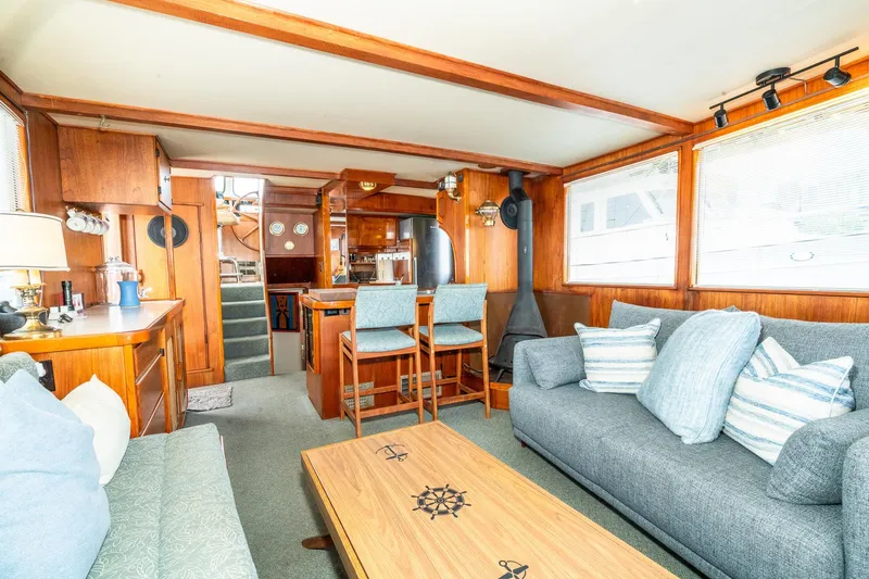 Slide: The Image of Interior of a 1971 Philbrook's Trawler with cozy furnishings. - 8