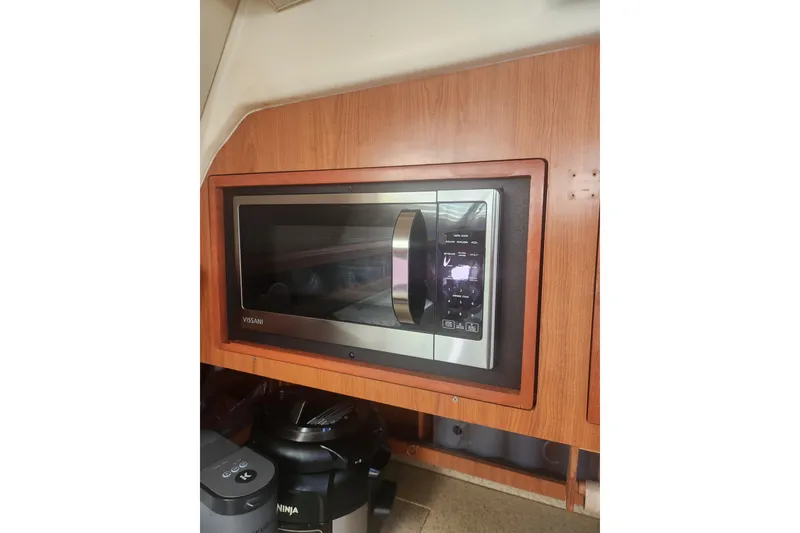 Slide: The Image of Built-in Vissani microwave in 2008 Hunter 450 yacht kitchen. - 14