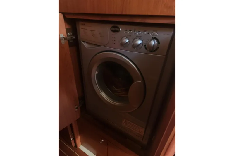Slide: The Image of Built-in washing machine in wooden cabinet, Hunter 450 model, 2008. - 22