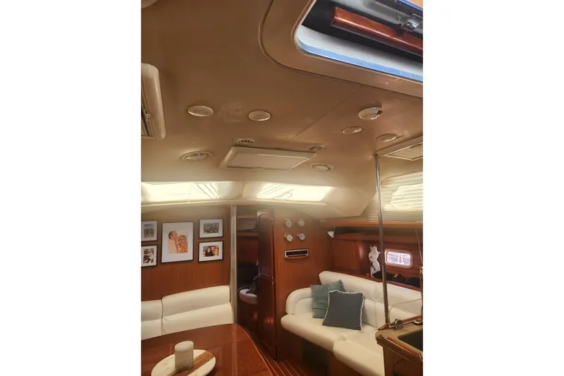 Slide: The Image of Interior of 2008 Hunter 450 yacht with cozy seating and decor. - 8