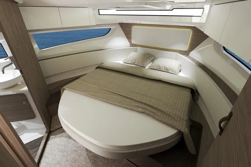 Slide: The Image of Manufacturer Provided Image: Luxurious interior cabin of 2026 Jeanneau NC 1095 Coupe Series 2 yacht. - 6