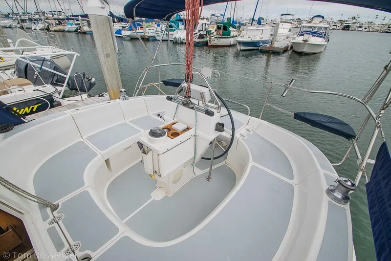 Slide: The Image of Cockpit of a 1995 Hunter 336 sailboat docked at a marina. - 22