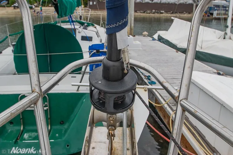 Slide: The Image of Close-up of a 1995 Hunter 336 sailboat's bow with furling system at dock. - 29
