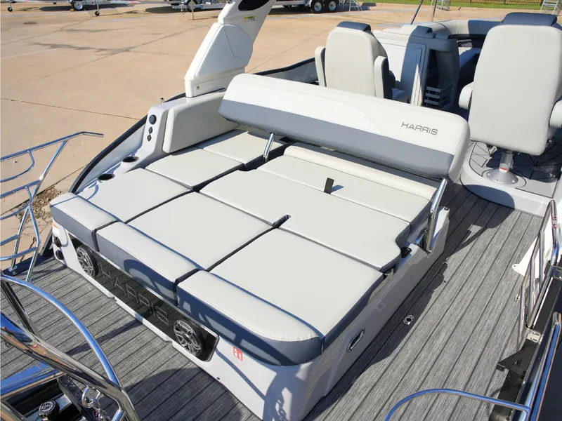 Slide: The Image of The image shows the deck of a 2027 Harris Grand Mariner 250 with gray upholstery. - 31