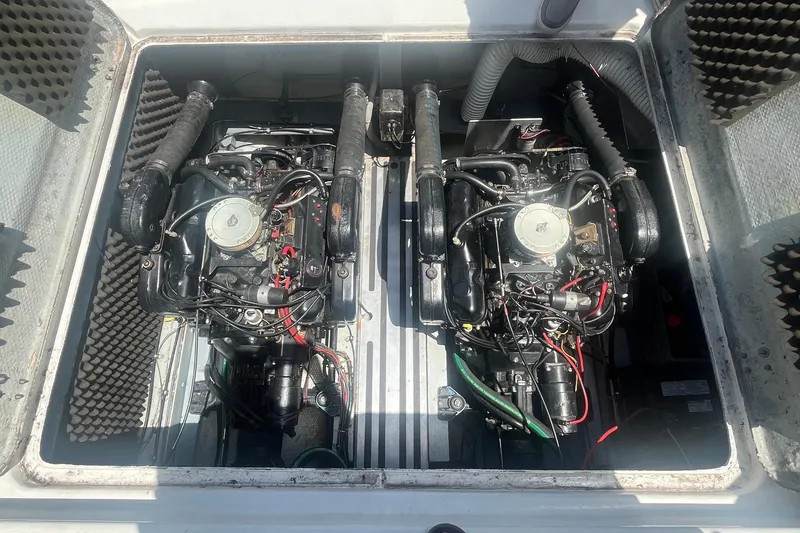 Slide: The Image of Twin engines in a 1988 Seafox 29 Flybridge boat engine compartment. - 23