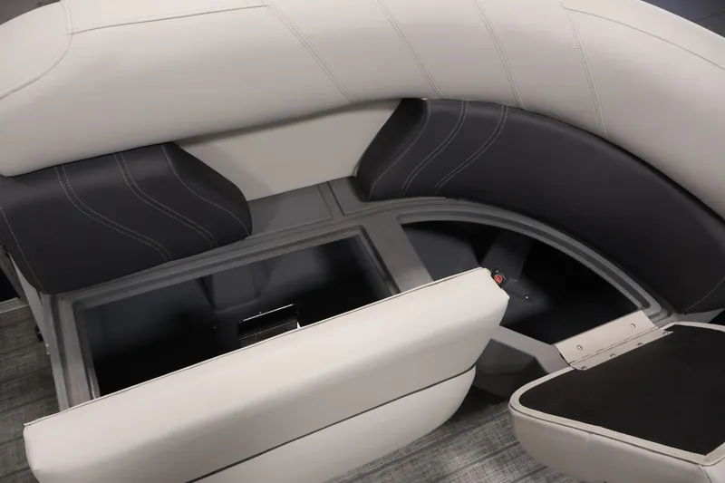 Slide: The Image of 2022 Sylvan 8520 Mirage boat interior storage compartment with cushioned seating. - 13