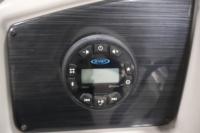 Slide: The Image of Jensen marine audio system on 2022 Sylvan 8520 Mirage boat dashboard. - 19