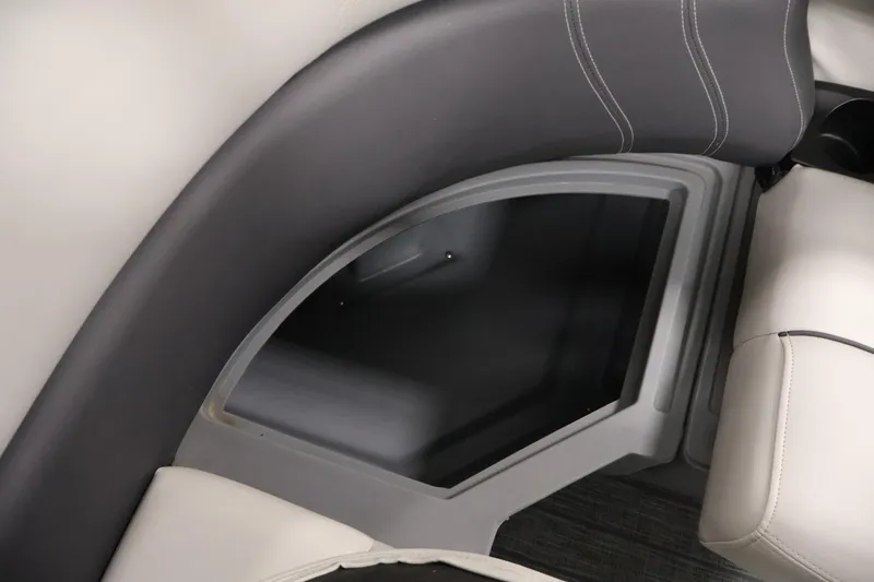 Slide: The Image of 2022 Sylvan 8520 Mirage boat interior storage compartment with cushioned seating. - 29