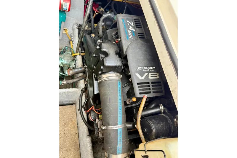 Slide: The Image of Engine compartment of a 2000 Silverton 351 Sedan with Mercury MerCruiser V8 engine. - 29