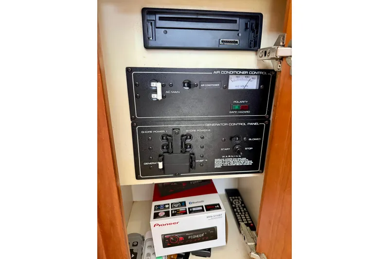 Slide: The Image of Control panel inside a 2000 Silverton 351 Sedan boat with Pioneer stereo box. - 41