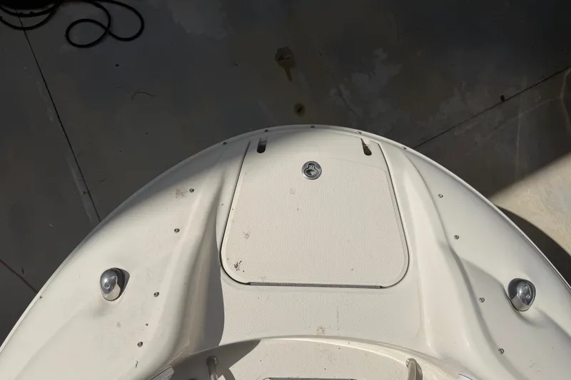 Slide: The Image of Bow of a 2006 Sea Ray 240 Sundeck boat in sunlight. - 56