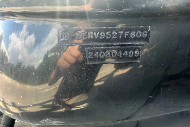 Slide: The Image of Hull identification number on a 2006 Sea Ray 240 Sundeck boat. - 58