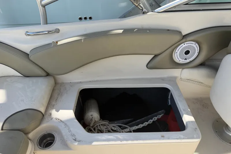 Slide: The Image of Storage compartment on a 2006 Sea Ray 240 Sundeck boat interior. - 39