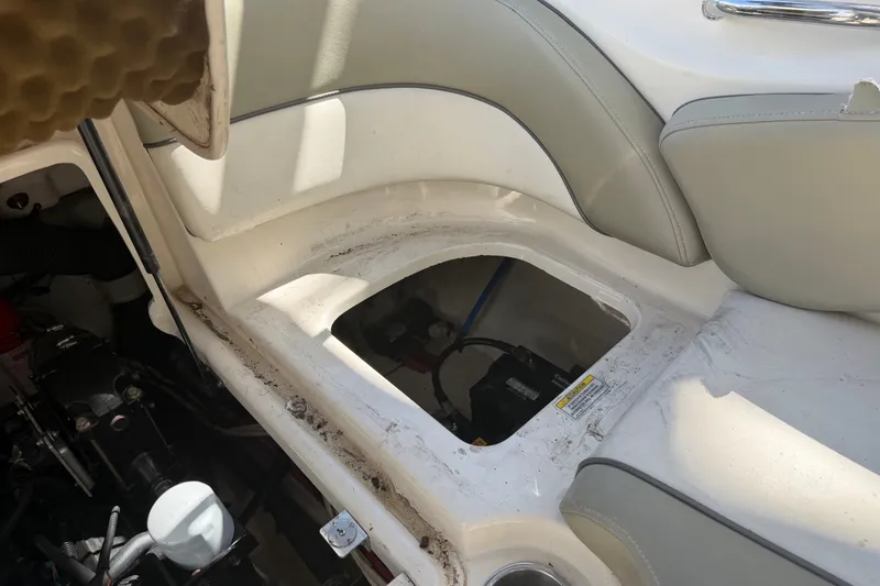 Slide: The Image of Open storage compartment in 2006 Sea Ray 240 Sundeck boat interior. - 36