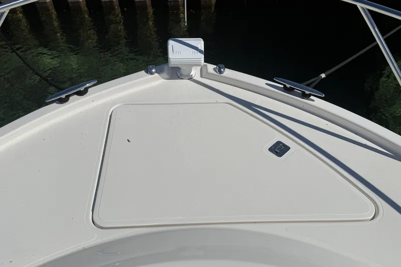 Slide: The Image of Bow of 2019 Tiara Yachts C44 Coupe, featuring sleek design and cleats. - 16