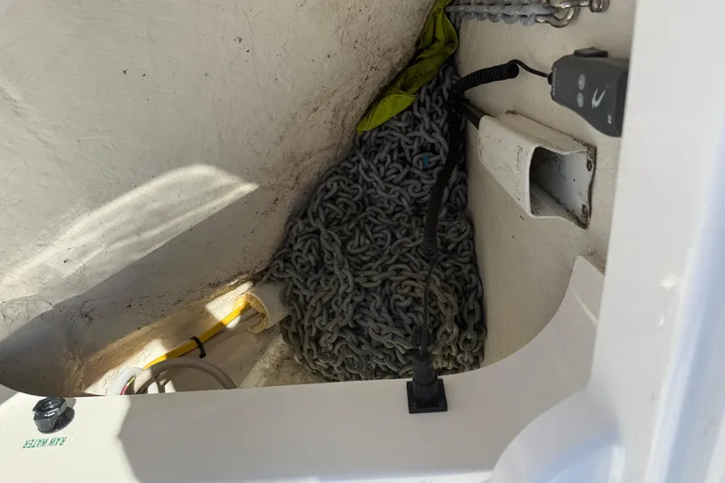 Slide: The Image of Anchor chain in storage compartment of a 2019 Tiara Yachts C44 Coupe. - 17