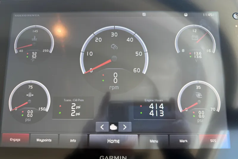 Slide: The Image of Dashboard display of a 2019 Tiara Yachts C44 Coupe with engine metrics. - 39
