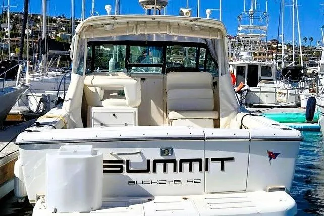 The Image of 2001 Tiara Yachts 2900 Open docked, featuring spacious seating and sleek design. - 0