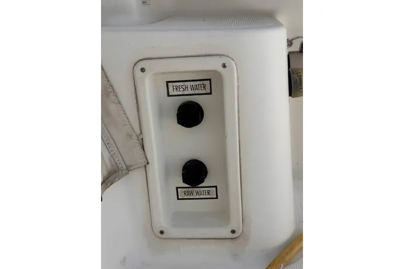 Slide: The Image of Control panel on 2001 Tiara Yachts 2900 Open for fresh and raw water systems. - 19