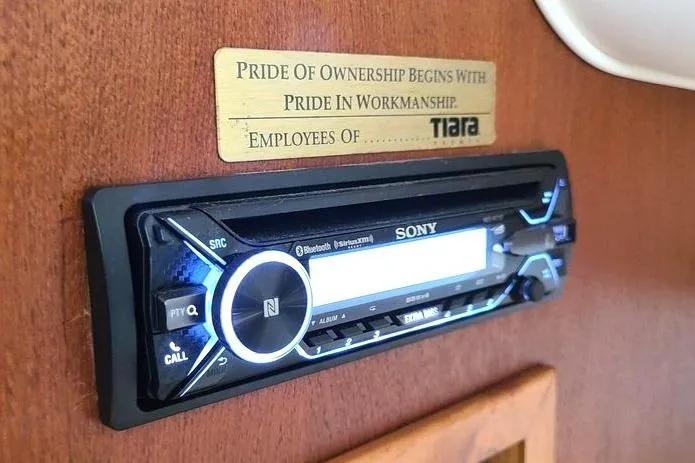 Slide: The Image of Sony stereo system in a 2001 Tiara Yachts 2900 Open, highlighting craftsmanship pride. - 21