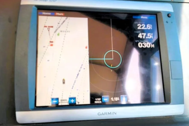 Slide: The Image of Garmin navigation display on 2001 Tiara Yachts 2900 Open, showing map and coordinates. - 3