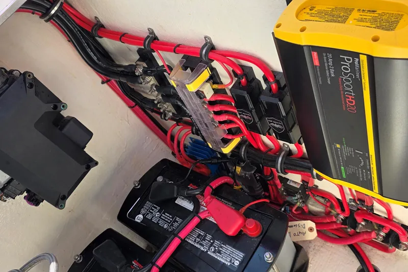 Slide: The Image of Electrical system of 2024 Velocity 290 Sport Cruiser with ProSport HD20 charger and batteries. - 16