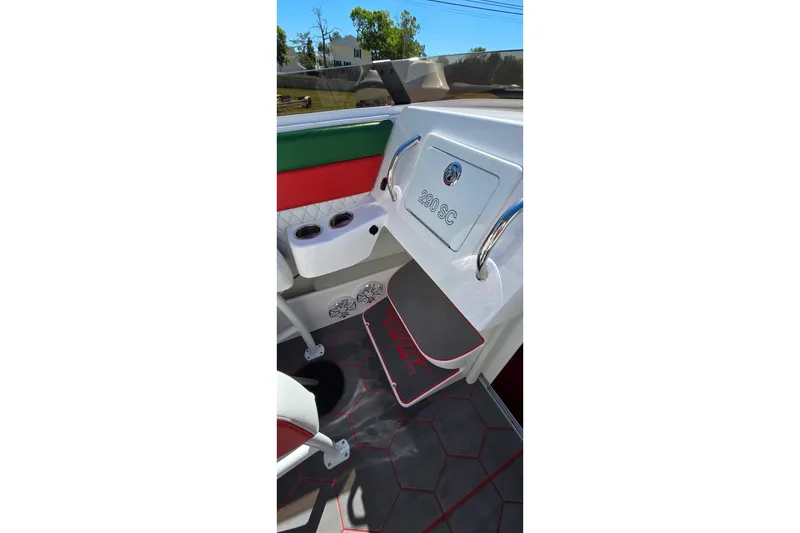Slide: The Image of 2024 Velocity 290 Sport Cruiser interior with sleek design and vibrant accents. - 17