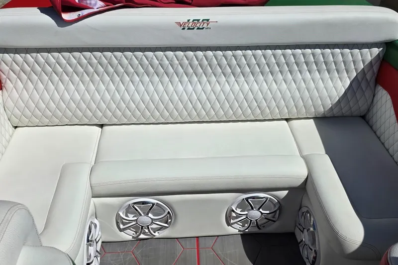 Slide: The Image of Luxurious seating in the 2024 Velocity 290 Sport Cruiser with premium speakers and quilted upholstery. - 6
