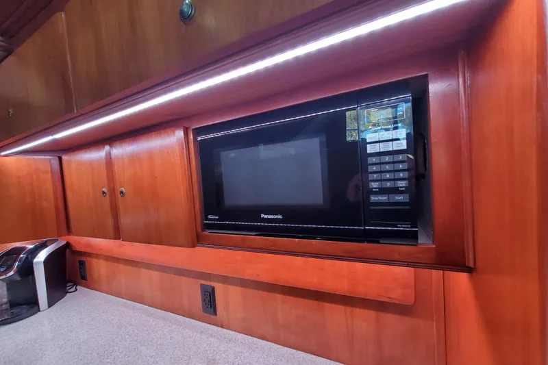 Slide: The Image of Microwave in the kitchen of a 2000 Silverton 42 Convertible yacht. - 17